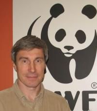 Sergei in front of WWF banner