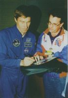Sergei signs an autograph