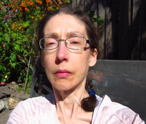 Me reveling in sunshine in my parents' backyard, 11/10/2018