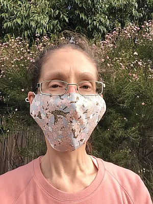 Me wearing one of my floral facemasks