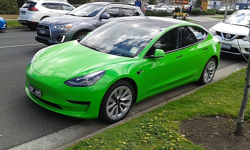 Lime-green Tesla car